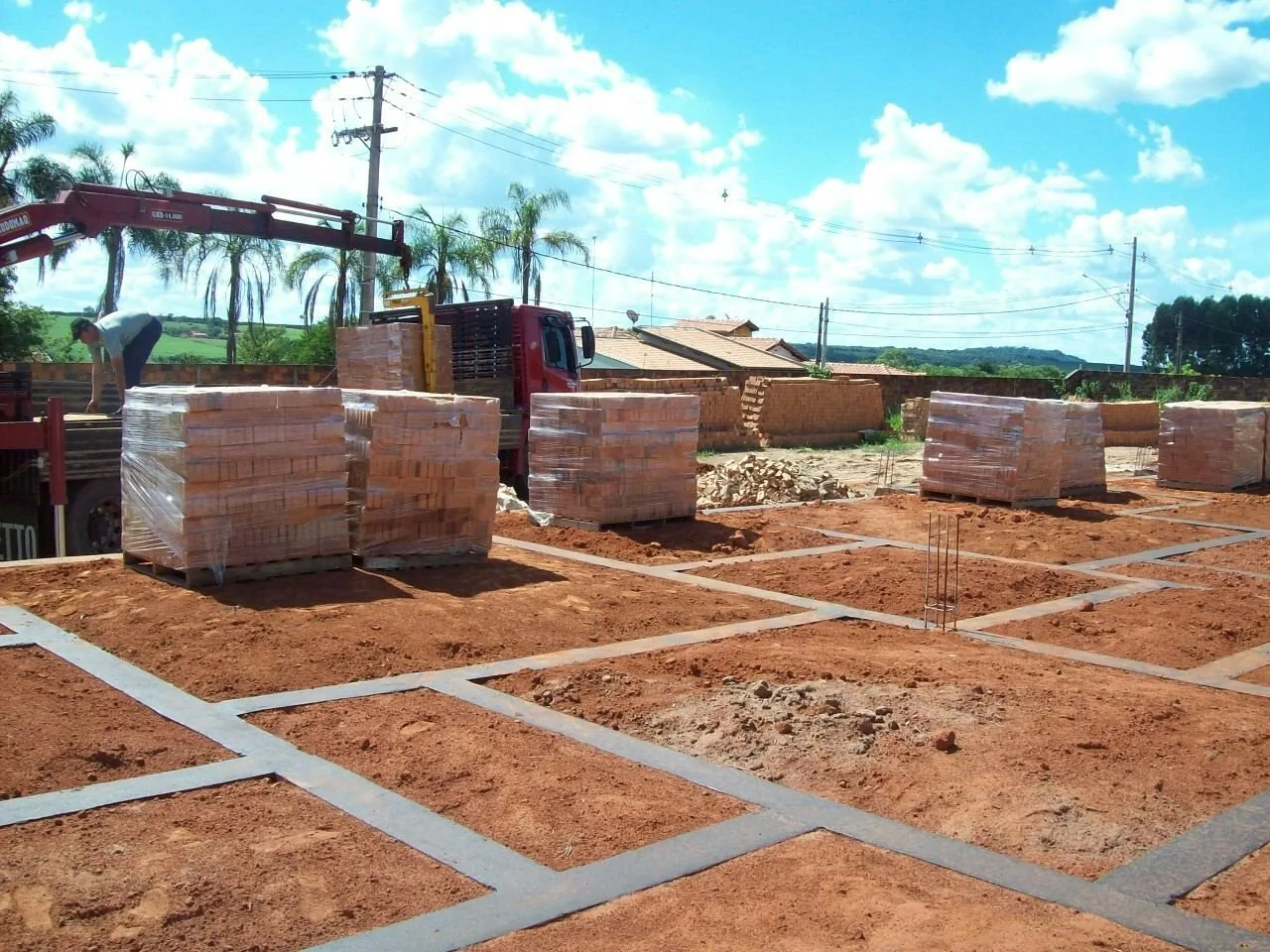 Preparação e tijolos na obra